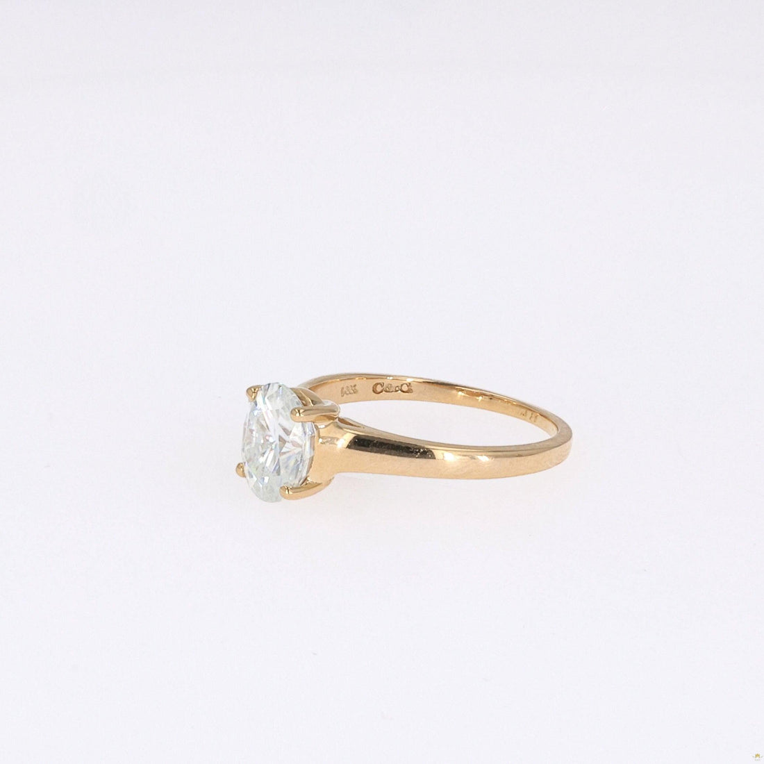 1.50 CTW   Oval Near-Colorless Moissanite Solitaire Ring in 14K Yellow Gold