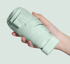 Women's Portable Mini Folding Umbrella 50% UV Protection 60% Sun and Rain Dual Use 50% off Capsule Design for Travel